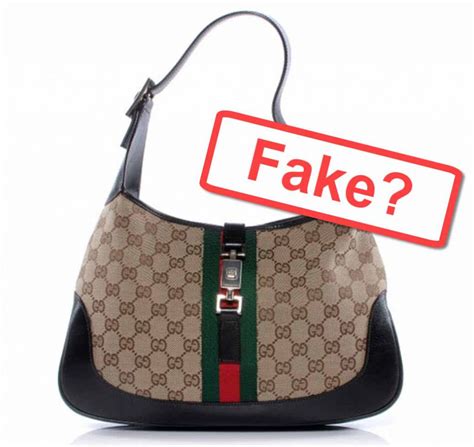 fale gucci purse